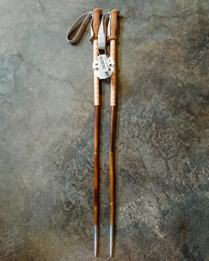 Dark tanned bamboo ski poles with grip extension of reindeer leather.