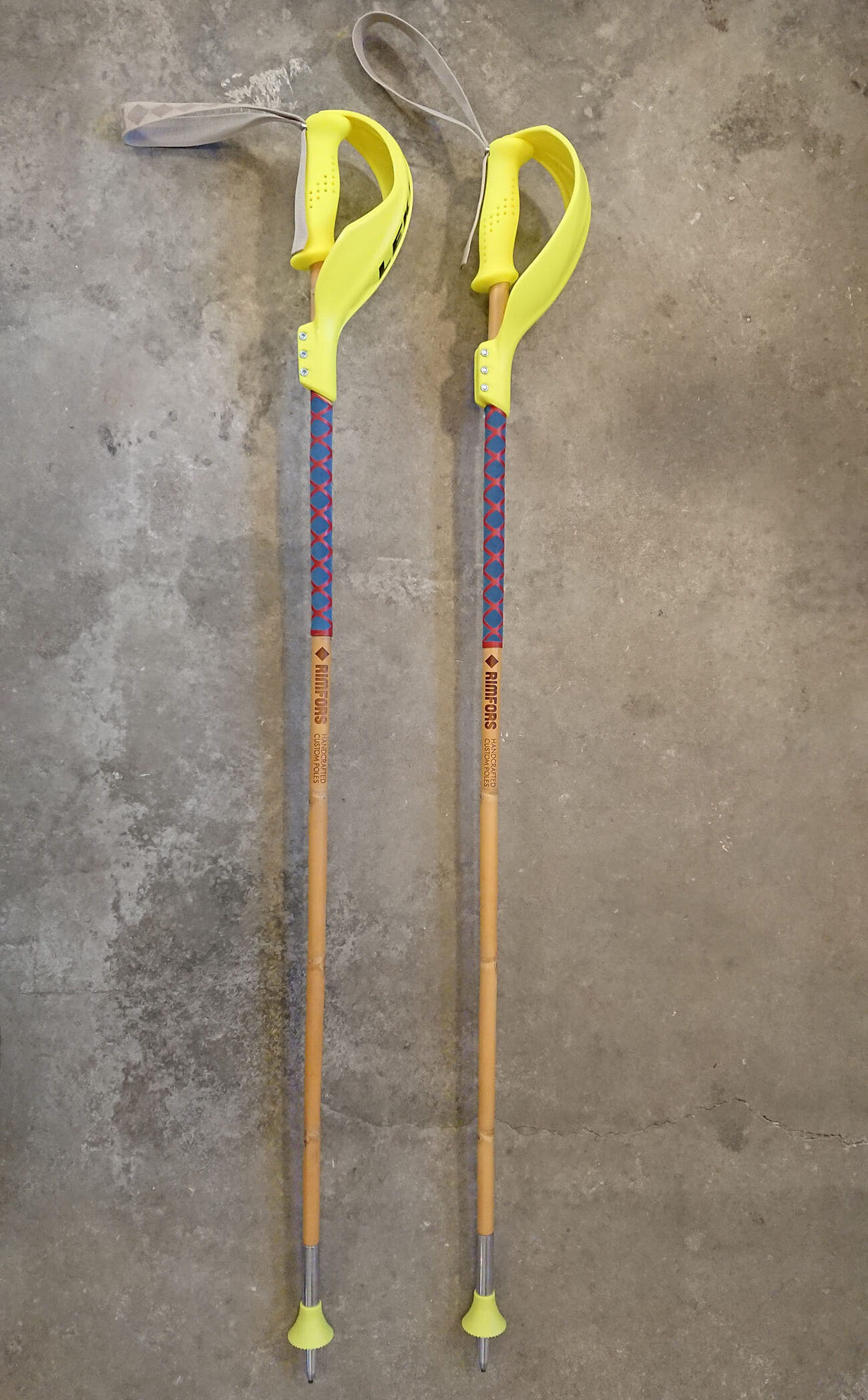 Alpine SL bamboo ski poles for racing, with matching fluorescent yellow grips, baskets and punch guards for slalom gates.