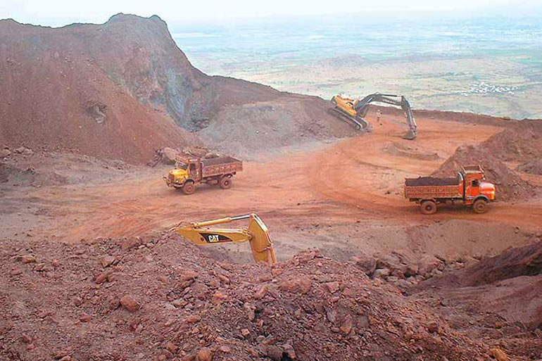 An open pit mine for bauxite (aluminum). Use as little as possible of this material, and when needed, use recycled aluminum!