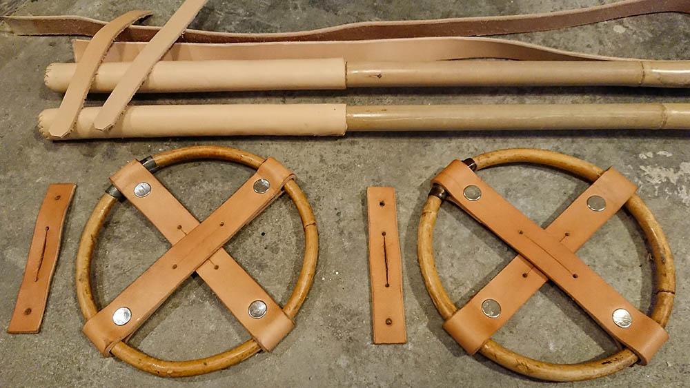 Leather kit for renovating bamboo poles with new baskets, grips, and straps.
