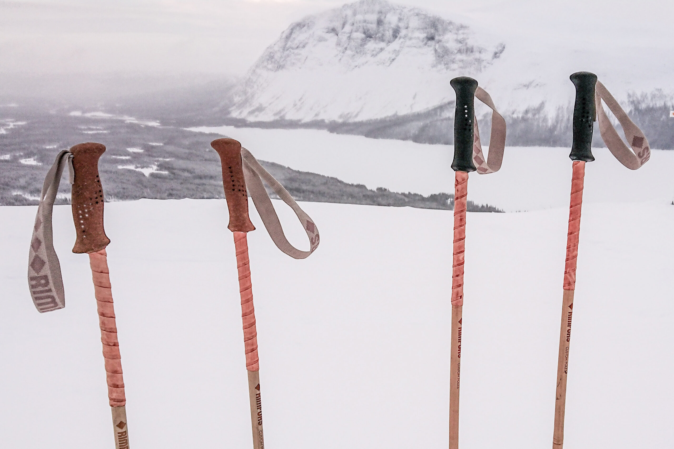 Bamboo ski poles with extended grip from wound bark tanned reindeer hide.