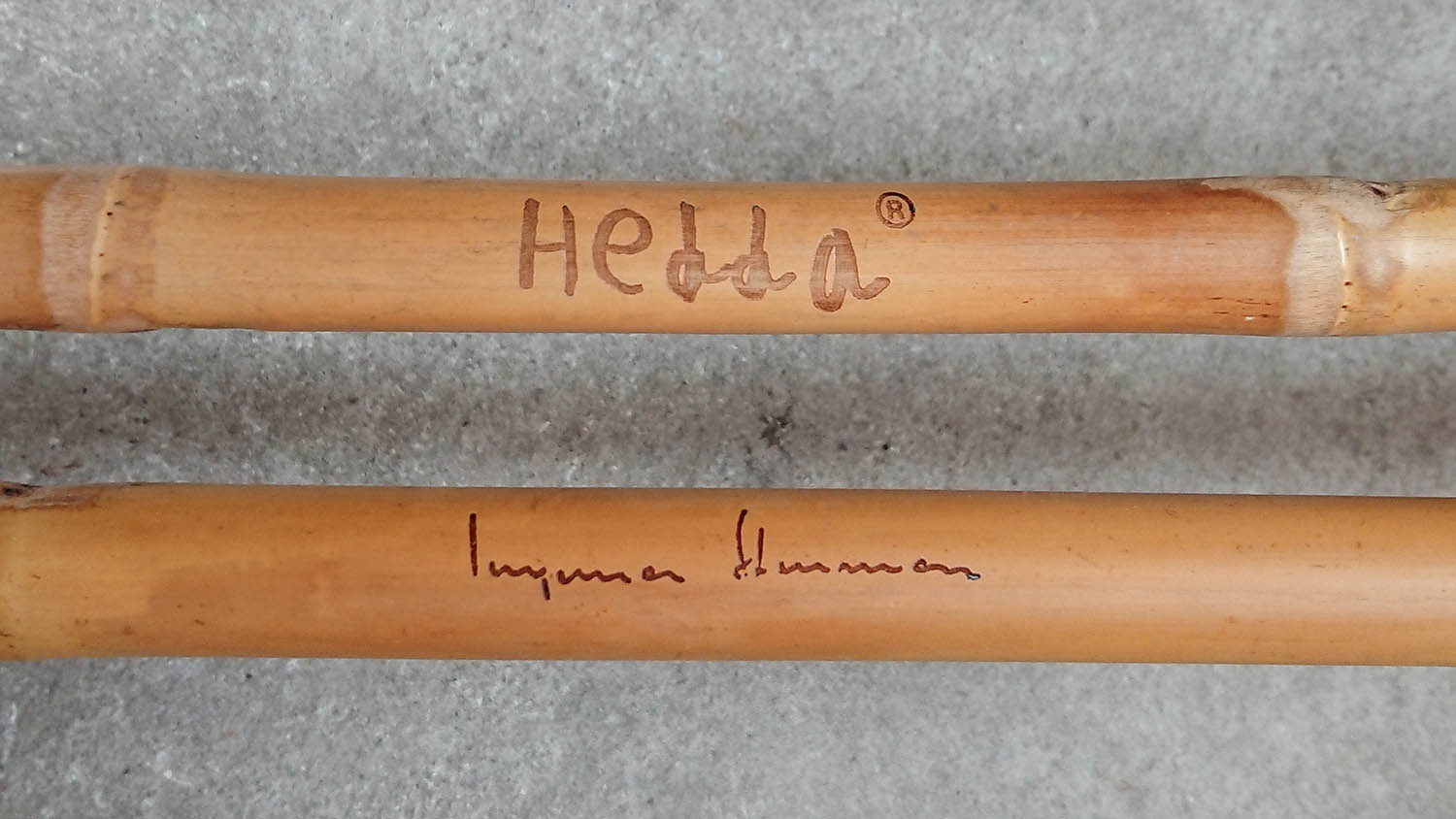 Bamboo ski poles with a laser engraved signature.