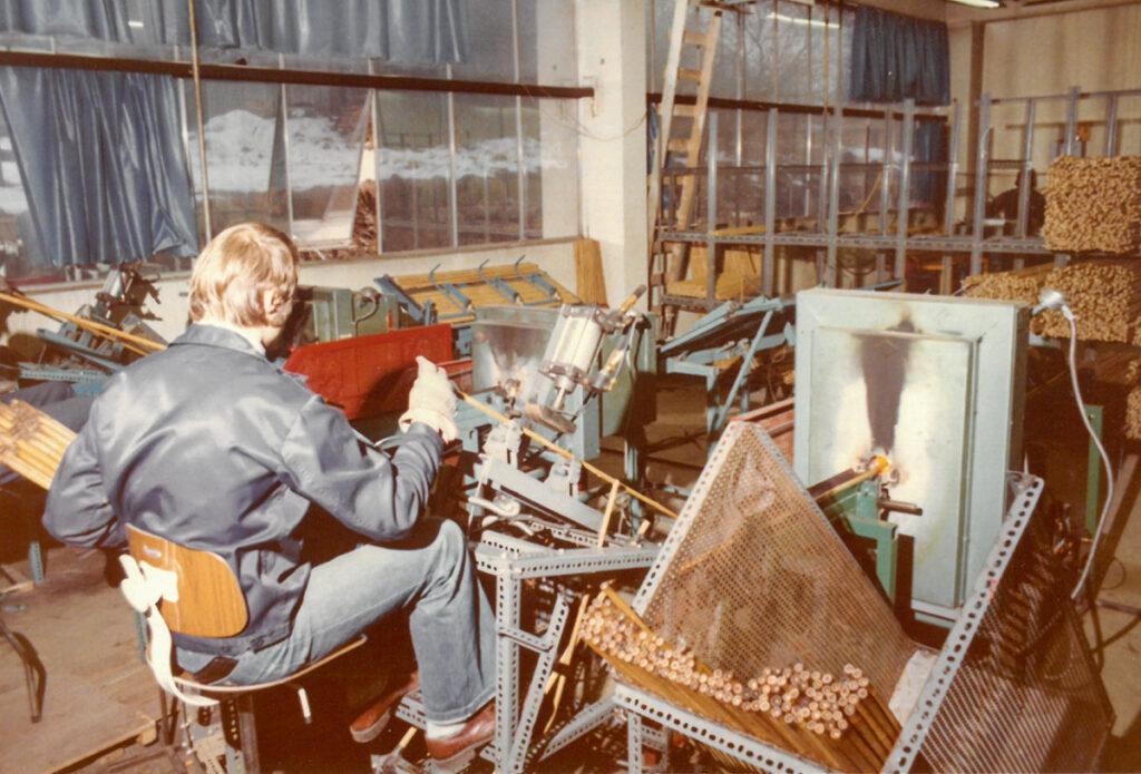 The bamboo sticks went through an oven that made the bamboo very flexible so that it could be straightened with a type of big stamp. Swix/Liljedahl's ski pole factory in 1976.